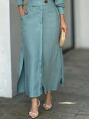 Vestido Feminino com Decote em V, Fenda e Bolsos – Elegância e Conforto para a Meia-Estação